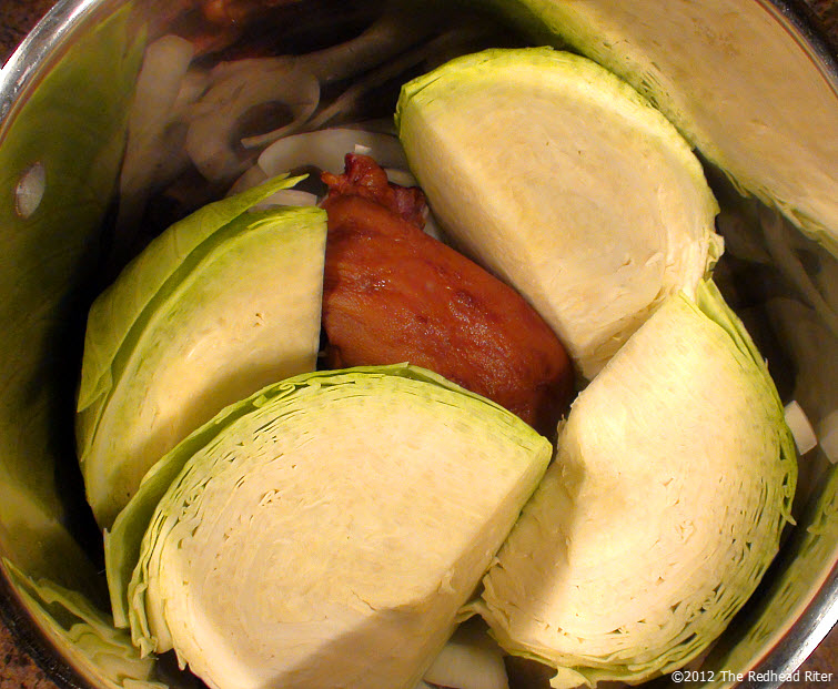 put quartered cabbage pieces in pot put quartered cabbage pieces in pot